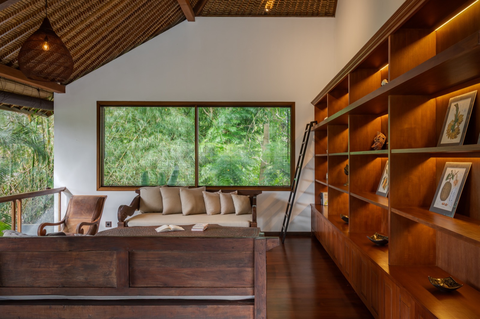 Library — bookshelf and teak day beds