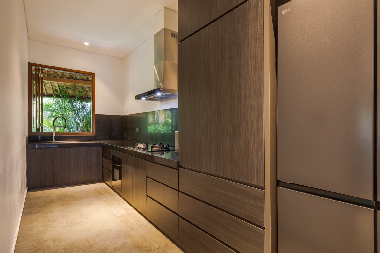 Wet kitchen with gas stove and storage