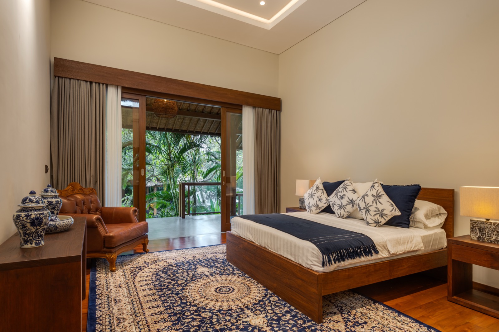 Bedroom 4 — wide view with blue rug